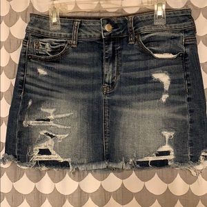 Distressed denim skirt